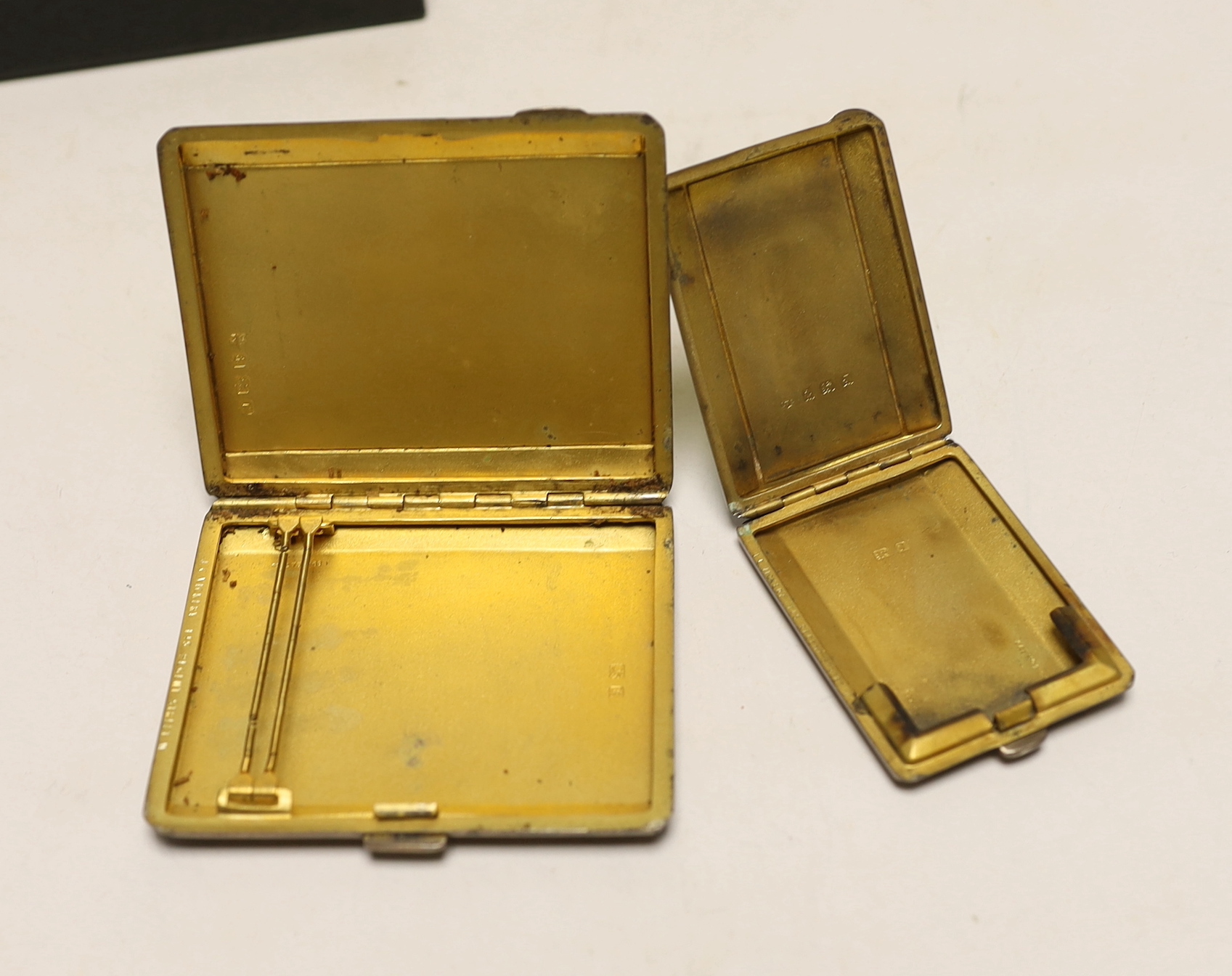 A 1930's Art Deco silver and two colour enamelled cigarette case, William Neale Ltd, Birmingham, 1934, 83mm and a matching match case, Birmingham, 1933.